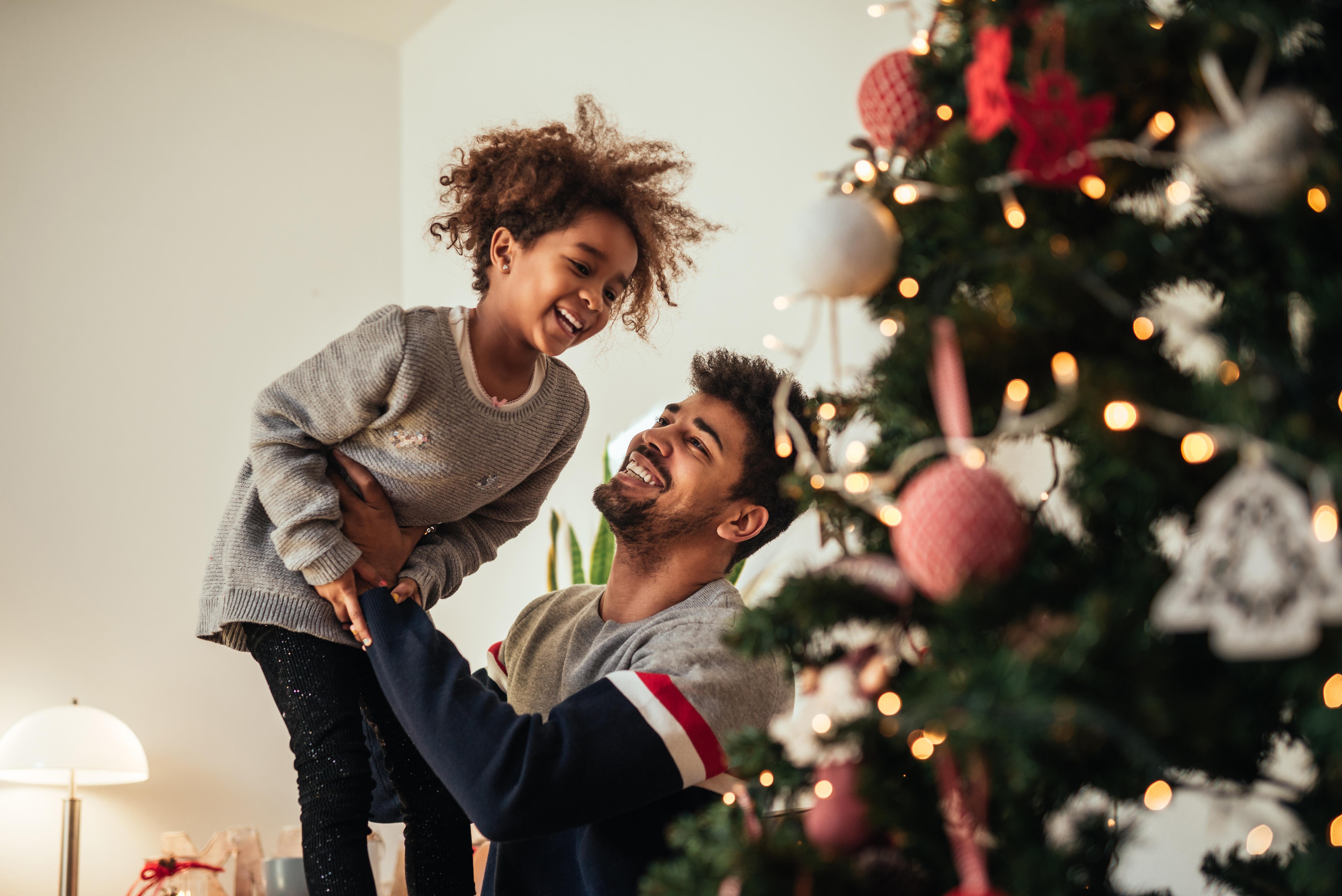 cute-african-american-girl-playing-with-dad-home.jpg